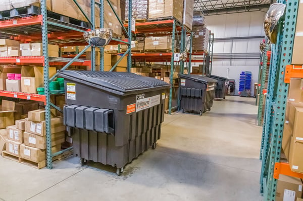 industrial recycling bins in pc/nametag's production facility