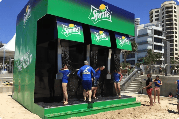 Swimmers use a brand activation by Sprite to cool off