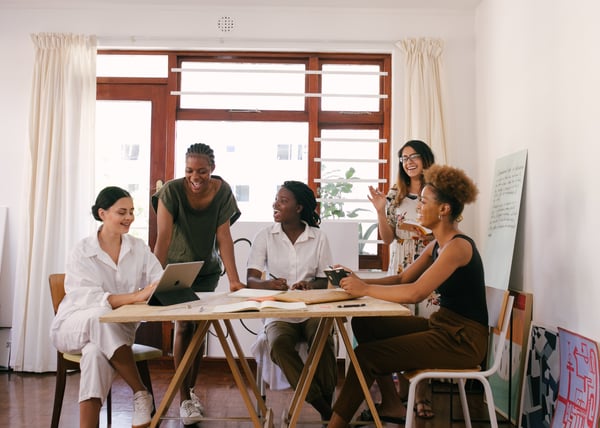 Employees collaborate on a group project