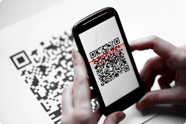 event attendee scans a QR code