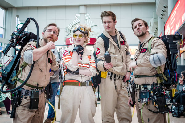 convention cosplayers dress up as ghostbusters characters