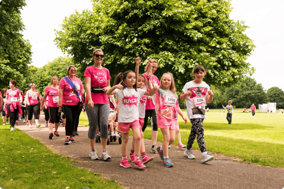 community members walk in a charity 5K