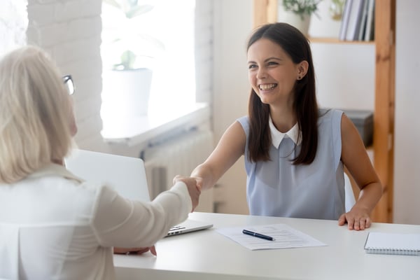 meeting planner secures event sponsorship with a handshake