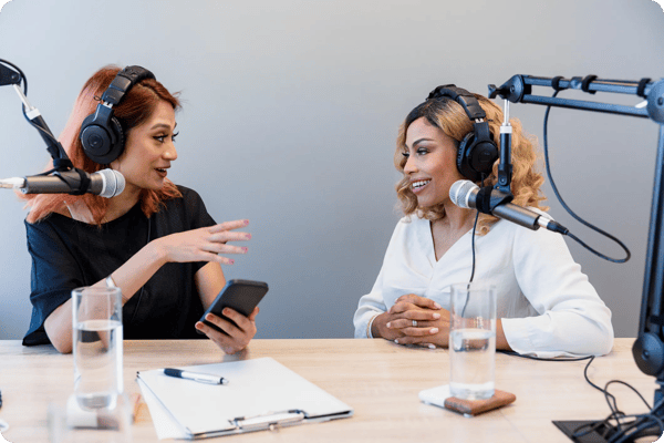 two women record an event planning podcast