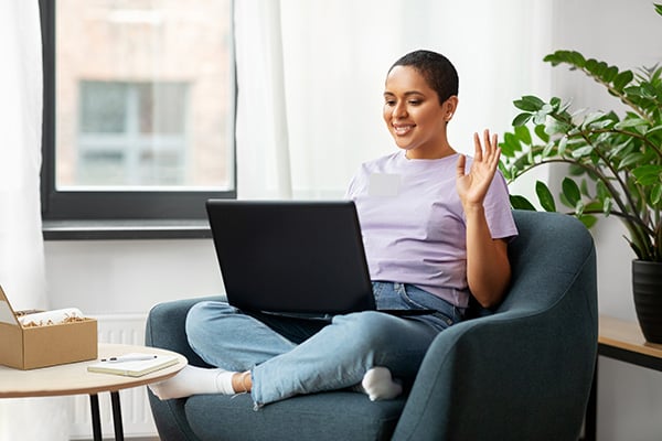 excited woman attends a virtual event session