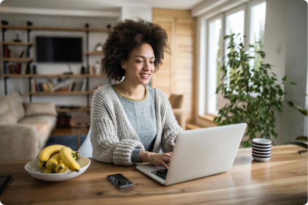 woman writes an employee spotlight for the company newsletter