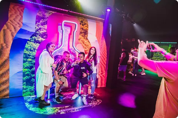 A neon photo spot at Coachella provided by Absolut Vodka