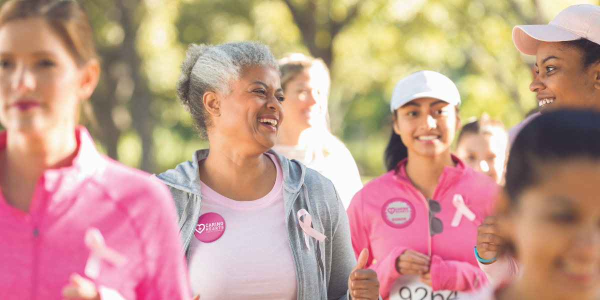 Participants walk in a sports charity 5K