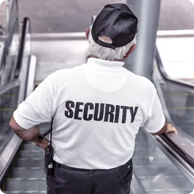 an event security staff member patrols a venue